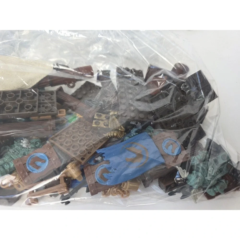 Large Mega Bloks lot Dragons Man o War pieces + challenge game pieces manuals